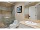 Well-lit bathroom featuring a step-in shower, a vanity with granite top, and neutral décor at 315 Prospect Dr, Castle Rock, CO 80108