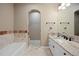 Elegant bathroom with dual sinks and a tub at 315 Prospect Dr, Castle Rock, CO 80108