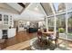Sun-drenched breakfast nook features stunning views and flows into the gourmet kitchen at 315 Prospect Dr, Castle Rock, CO 80108