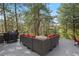 Outdoor deck area with comfortable seating and a grill, perfect for entertaining at 315 Prospect Dr, Castle Rock, CO 80108