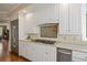 Well-equipped kitchen with stainless steel appliances, granite countertops and white cabinetry at 315 Prospect Dr, Castle Rock, CO 80108