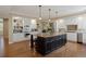 Spacious kitchen featuring a large island, stainless steel appliances, and custom white cabinetry at 315 Prospect Dr, Castle Rock, CO 80108