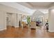 A bright living room with a fireplace, hardwood floors and vaulted ceilings at 315 Prospect Dr, Castle Rock, CO 80108