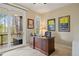 Home office with beautiful wood desk, natural light, and access to porch at 315 Prospect Dr, Castle Rock, CO 80108
