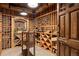 Charming wine cellar with wooden racks and storage for wine collections at 315 Prospect Dr, Castle Rock, CO 80108