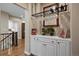 A wine storage space with white cabinets, wine rack, and ladder at 315 Prospect Dr, Castle Rock, CO 80108