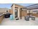 Outdoor rooftop deck featuring a gas grill, mini fridge, and a seating area under a pergola at 8331 Farmers Way, Highlands Ranch, CO 80129