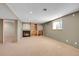 The living room boasts a fireplace and built-in shelving, awaiting personal touches at 10978 W Ada Pl, Lakewood, CO 80226