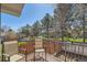 Charming back deck with outdoor seating, perfect for enjoying the fenced backyard and peaceful surroundings at 5190 S Emporia Way, Greenwood Village, CO 80111