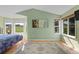Spacious bedroom with large windows offering plentiful natural light and picturesque views at 10519 Winterflower Way, Parker, CO 80134