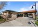 The building's entrance boasts modern architecture, ample parking, and an inviting atmosphere at 10519 Winterflower Way, Parker, CO 80134
