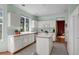 Bright and airy kitchen with stainless steel appliances and an island, perfect for meal preparation at 10519 Winterflower Way, Parker, CO 80134