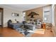 Inviting living room with hardwood floors and a comfortable seating arrangement at 10519 Winterflower Way, Parker, CO 80134