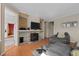 Cozy living room with a stone fireplace and comfortable seating at 10519 Winterflower Way, Parker, CO 80134
