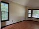 Bright living room featuring tile floors, neutral walls, and multiple windows at 10519 Winterflower Way, Parker, CO 80134