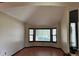 Bright living room featuring a bay window and neutral walls at 10519 Winterflower Way, Parker, CO 80134