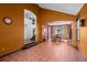 Spacious living area with an open view of the dining room, staircase, and hardwood floors at 10519 Winterflower Way, Parker, CO 80134