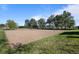 Community sand volleyball court is a fun amenity for residents to enjoy outdoor recreation and games at 10519 Winterflower Way, Parker, CO 80134