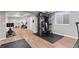 Basement gym featuring state-of-the-art fitness equipment and a spacious workout area at 1301 Sidewinder Cir, Castle Rock, CO 80108