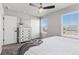 Bedroom with neutral tones, a ceiling fan, and plentiful natural light at 1301 Sidewinder Cir, Castle Rock, CO 80108