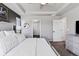Neutral toned main bedroom showcasing decorative ceiling, carpet and doorway at 1301 Sidewinder Cir, Castle Rock, CO 80108