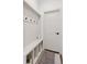 A bright mudroom with storage, a bench, hooks, and a stylish rug at 1301 Sidewinder Cir, Castle Rock, CO 80108