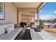 Relaxing outdoor patio with a comfortable seating, BBQ and a modern fire pit at 1301 Sidewinder Cir, Castle Rock, CO 80108
