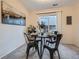 Cozy dining area featuring modern decor, a sliding glass door, and plenty of natural light at 5511 S Lowell Blvd, Littleton, CO 80123