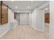 Finished basement area with recessed lights and stylish sliding barn doors at 1345 N Franklin St, Denver, CO 80218