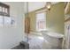 Bright bathroom featuring a walk-in shower, and a clawfoot tub at 1345 N Franklin St, Denver, CO 80218