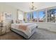 Bedroom features carpet, modern fixtures, and large windows at 1345 N Franklin St, Denver, CO 80218