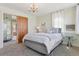 Bedroom showcases an ensuite bathroom and comfortable carpet at 1345 N Franklin St, Denver, CO 80218