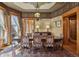 Formal dining room with a large wooden table, ornate chandelier, and stylish decor at 1345 N Franklin St, Denver, CO 80218