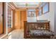 Inviting foyer with wood accents, natural light, tile floors, and bench seating near a light-filled stairwell at 1345 N Franklin St, Denver, CO 80218