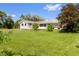 Charming ranch-style home with a well-manicured lawn, mature trees and a peaceful outdoor setting at 7313 S Boulder Rd, Boulder, CO 80303