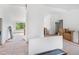 Spacious living room featuring large windows, fireplace, and abundant natural light, ready for finishing at 7313 S Boulder Rd, Boulder, CO 80303