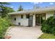 Back patio with sliding glass doors that offer transition from indoor living to the outdoors at 7313 S Boulder Rd, Boulder, CO 80303