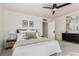 Comfortable bedroom featuring a ceiling fan, stylish nightstands, and a well-dressed bed at 2705 N Lafayette St, Denver, CO 80205