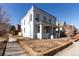 Charming two-story home with a covered front porch situated on a desirable corner lot at 2705 N Lafayette St, Denver, CO 80205