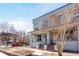 Two-story home with a welcoming covered front porch, and potential for personalized landscaping at 2705 N Lafayette St, Denver, CO 80205