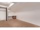 Neutral bedroom with a built-in desk and a closet providing ample storage at 1828 Stratford Ln, Longmont, CO 80503