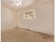 Well-lit bedroom with a window offering natural light at 1828 Stratford Ln, Longmont, CO 80503