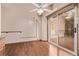 Dining area featuring hardwood floors and sliding glass doors to the exterior at 1828 Stratford Ln, Longmont, CO 80503