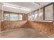 Bright garage with exposed framing and windows at 1828 Stratford Ln, Longmont, CO 80503
