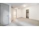 Spacious bedroom featuring neutral carpeting and crisp white walls at 822 Fairfax St, Denver, CO 80220