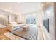 Modern living room featuring a fireplace, stylish decor, and sliding glass doors that leads to the outside at 822 Fairfax St, Denver, CO 80220