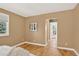 Bedroom featuring hardwood floors and a window view at 8165 W Stene Dr, Littleton, CO 80128