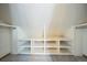 Attic with built-in closet storage, ideal for organization and maximizing space in your home at 10729 Kipling Way, Broomfield, CO 80021