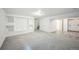 Spacious basement featuring plush carpet, storage, and versatile living space at 10729 Kipling Way, Broomfield, CO 80021