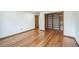 This bedroom boasts gleaming hardwood floors and a large built-in closet, perfect for ample storage and organization at 10729 Kipling Way, Broomfield, CO 80021